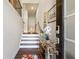 Bright entryway with staircase, console table, and modern decor at 505 Stagecoach Bnd, Smyrna, GA 30080