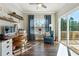 Home office features built-in shelving, hardwood floors, and sliding glass doors at 505 Stagecoach Bnd, Smyrna, GA 30080
