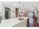 Island kitchen with white cabinets, quartz countertops, and stainless steel appliances at 505 Stagecoach Bnd, Smyrna, GA 30080