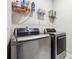 Laundry room with LG washer and dryer, and shelving at 505 Stagecoach Bnd, Smyrna, GA 30080