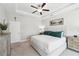 Main bedroom with tray ceiling, ceiling fan, and walk-in closet at 505 Stagecoach Bnd, Smyrna, GA 30080