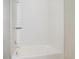 Bathroom with white subway tile and bathtub at 221 Heritage Town Pkwy, Canton, GA 30115