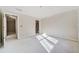 Spacious bedroom with large window and hardwood floors at 221 Heritage Town Pkwy, Canton, GA 30115