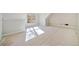 Spacious bedroom with large window and hardwood floors at 221 Heritage Town Pkwy, Canton, GA 30115