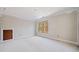 Bright bedroom with large window and hardwood floors at 221 Heritage Town Pkwy, Canton, GA 30115