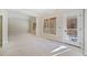 Bright living room with access to back porch at 221 Heritage Town Pkwy, Canton, GA 30115