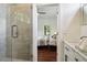 Bathroom with a walk-in shower and view into a bedroom at 2256 Barge Sw Rd, Atlanta, GA 30331