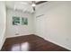 Bright bedroom with dark hardwood floors and double closets at 2256 Barge Sw Rd, Atlanta, GA 30331