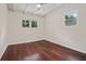 Well-lit bedroom featuring hardwood floors and ceiling fan at 2256 Barge Sw Rd, Atlanta, GA 30331