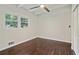 Bright bedroom with dark hardwood floors and double closets at 2256 Barge Sw Rd, Atlanta, GA 30331