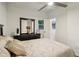 Bright bedroom with dark hardwood floors and ceiling fan at 2256 Barge Sw Rd, Atlanta, GA 30331