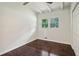 Bright bedroom with dark hardwood floors and double closets at 2256 Barge Sw Rd, Atlanta, GA 30331