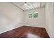 Bright bedroom with hardwood floors and ceiling fan at 2256 Barge Sw Rd, Atlanta, GA 30331