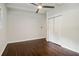 Simple bedroom with dark hardwood floors and large closets at 2256 Barge Sw Rd, Atlanta, GA 30331