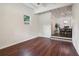 Bright living room with hardwood floors and view of dining area at 2256 Barge Sw Rd, Atlanta, GA 30331