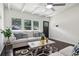 Living room with dark hardwood floors, light walls, and comfortable seating at 2256 Barge Sw Rd, Atlanta, GA 30331