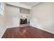 Spacious living room with hardwood floors and open view to dining area at 2256 Barge Sw Rd, Atlanta, GA 30331