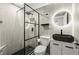 Modern bathroom with a black sink and hexagonal tile at 2965 Pharr Court South Nw # 304, Atlanta, GA 30305