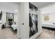 Hallway with a large piece of art and access to bedrooms at 2965 Pharr Court South Nw # 304, Atlanta, GA 30305