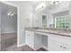 Double vanity bathroom with granite countertop and tile floor at 526 Bass Pointe Nw, Kennesaw, GA 30144