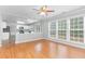 Spacious living room, hardwood floors, and kitchen view at 526 Bass Pointe Nw, Kennesaw, GA 30144