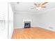 Bright living room featuring hardwood floors and fireplace at 526 Bass Pointe Nw, Kennesaw, GA 30144