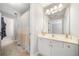 Bathroom with a vanity, toilet, and shower at 5585 Lavender Farms Rd, Powder Springs, GA 30127