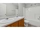 Bathroom with double vanity and shower/tub combo at 6235 Queen Meadow Se Dr, Mableton, GA 30126