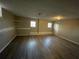 Finished basement with vinyl flooring and built in shelving at 1921 Clinton Pl, Lawrenceville, GA 30043