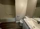 Clean bathroom, granite countertop, tub shower at 1921 Clinton Pl, Lawrenceville, GA 30043