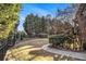 Landscaped backyard with a curved walkway at 2082 Greenway Mill Ct, Snellville, GA 30078