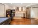 Basement kitchenette with white cabinets and stainless steel appliances at 2082 Greenway Mill Ct, Snellville, GA 30078