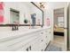 Elegant bathroom with double vanity and large mirror at 2082 Greenway Mill Ct, Snellville, GA 30078