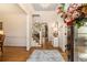 Elegant entryway with hardwood floors and a view of the staircase at 2082 Greenway Mill Ct, Snellville, GA 30078