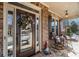 Inviting front porch with rocking chairs and a decorative wreath at 2082 Greenway Mill Ct, Snellville, GA 30078