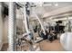 Home gym with various exercise equipment including elliptical and weight machine at 2082 Greenway Mill Ct, Snellville, GA 30078