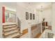 Open stairway and hallway showcasing hardwood floors and stylish decor at 2082 Greenway Mill Ct, Snellville, GA 30078