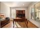 Spacious home office with built-in shelving and hardwood floors at 2082 Greenway Mill Ct, Snellville, GA 30078