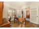 Sunlit home office with hardwood floors and French doors at 2082 Greenway Mill Ct, Snellville, GA 30078