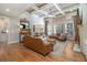 Spacious living room with hardwood floors, fireplace and coffered ceiling at 2082 Greenway Mill Ct, Snellville, GA 30078