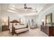 Spacious main bedroom with high ceilings, a large bed, and plenty of light at 2082 Greenway Mill Ct, Snellville, GA 30078