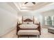 Main bedroom with post bed and neutral decor at 2082 Greenway Mill Ct, Snellville, GA 30078