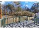 Fenced backyard with deck and grassy area at 285 Independence Dr, Jonesboro, GA 30238