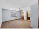 Main bedroom with ceiling fan, window, and door to bathroom at 285 Independence Dr, Jonesboro, GA 30238