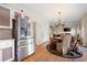 Bright dining area with hardwood floors and chandelier at 311 Tuggle Ct, Woodstock, GA 30188