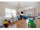 Spacious dining room with hardwood floors, a chandelier, and a basketball hoop at 311 Tuggle Ct, Woodstock, GA 30188