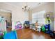 Playful dining room with hardwood floors and a chandelier at 311 Tuggle Ct, Woodstock, GA 30188