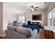 Playful living room with hardwood floors and ample natural light at 311 Tuggle Ct, Woodstock, GA 30188