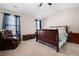 Large main bedroom with carpeted floor and ceiling fan at 311 Tuggle Ct, Woodstock, GA 30188