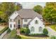 Stunning two-story home, stone accents, lush landscaping at 3214 Burnette Ne Dr, Roswell, GA 30075